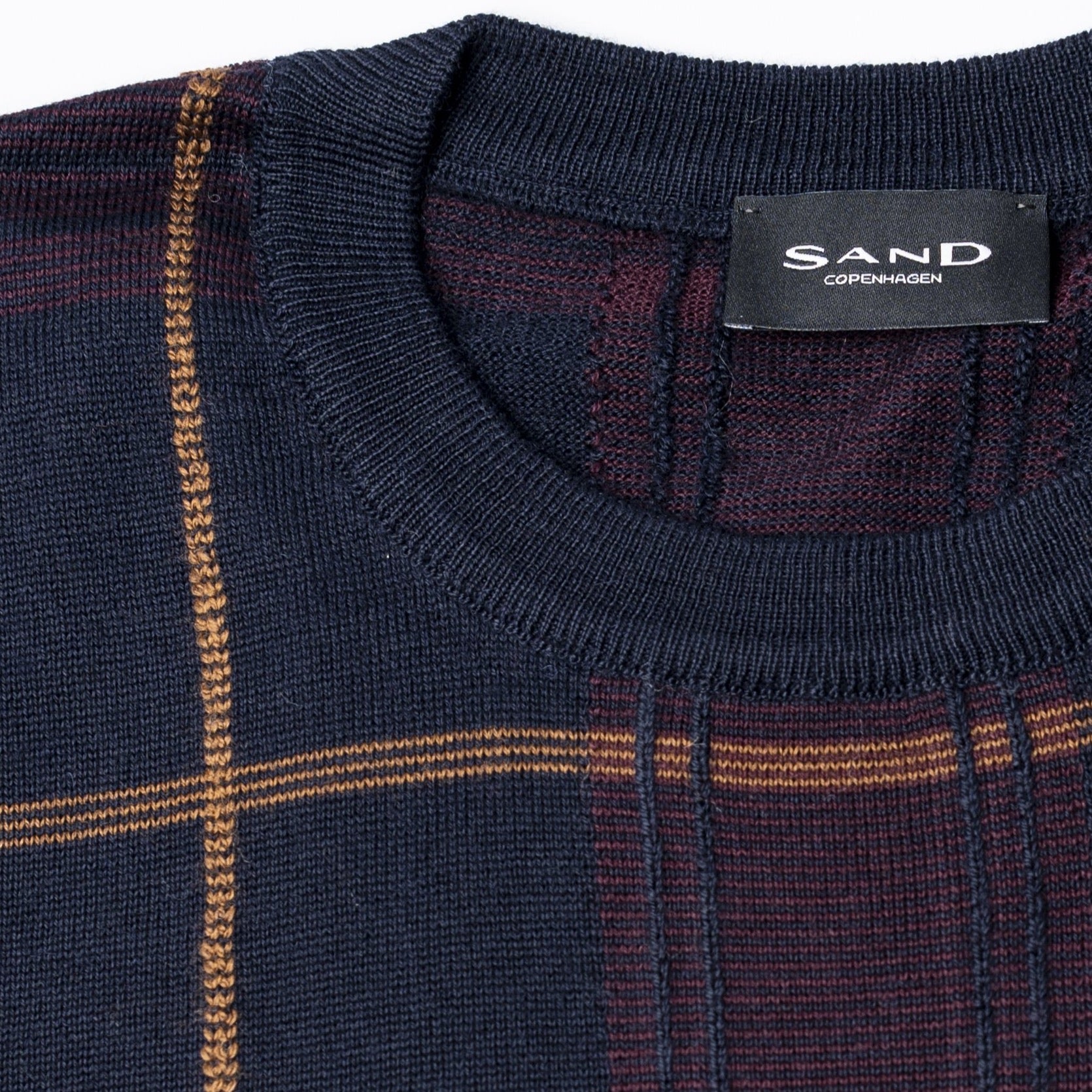 SAND MERINO CREW - NAVY CAMEL BIG CHECK